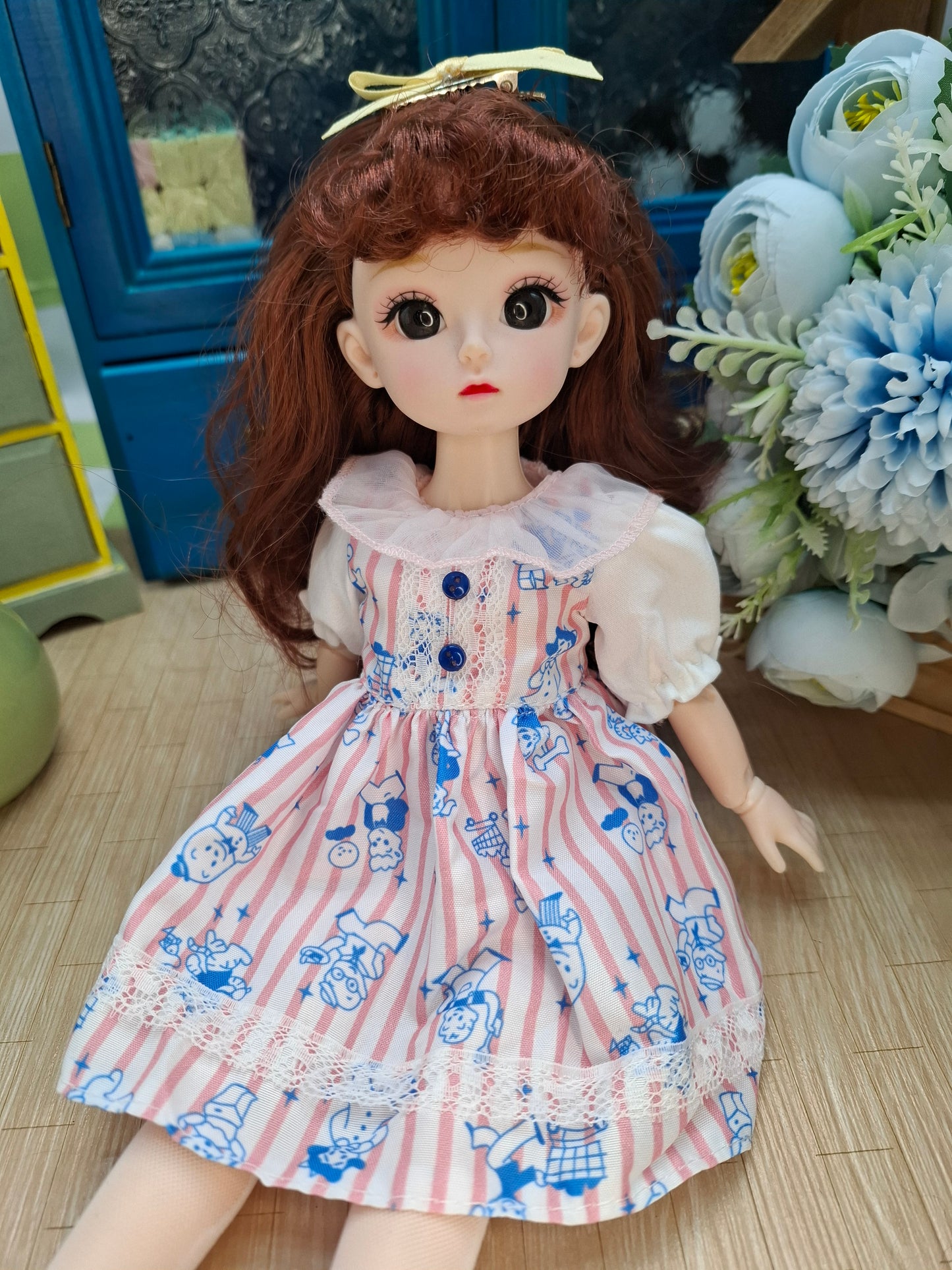 Mary the Waldorf Doll with brown hair in pink cartoon dress 30cm BJD Doll
