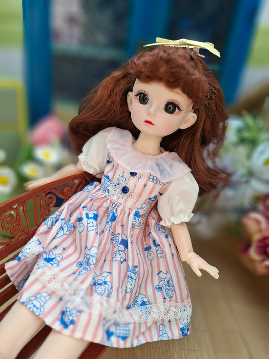 Mary the Waldorf Doll with brown hair in pink cartoon dress 30cm BJD Doll